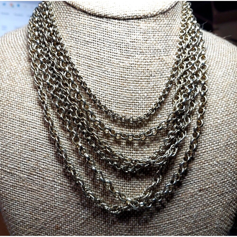 Necklace Goldtone 6-strand Floral closure 12" to 18"